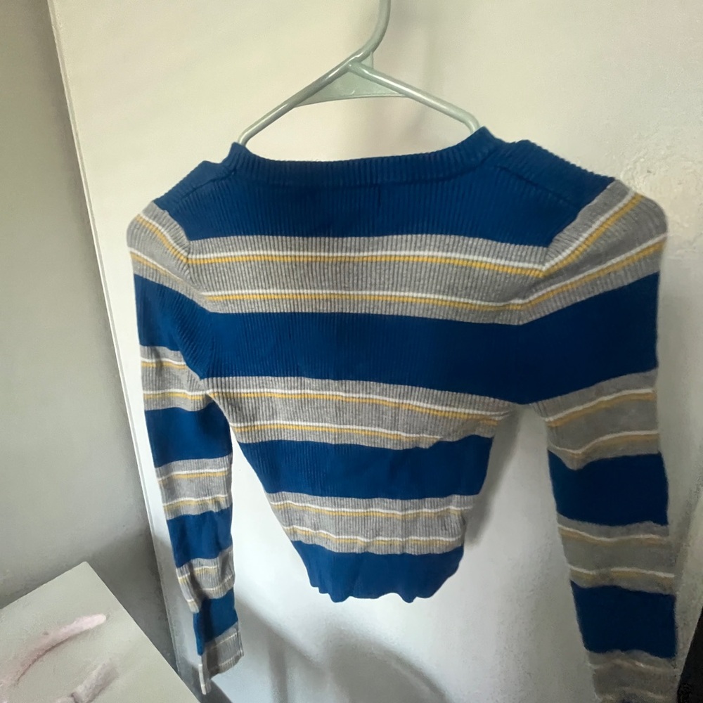 A very cute forever 21 shirt that is stretchy and very old school!.